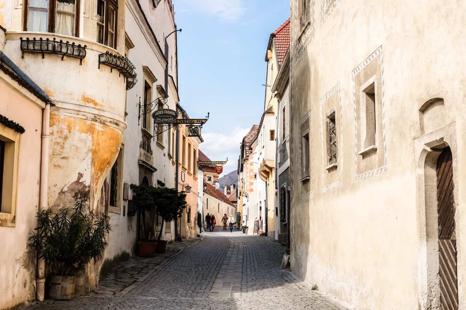 The narrow, pastel coloured Medieval and Baroque detailed village streets of Drnstein